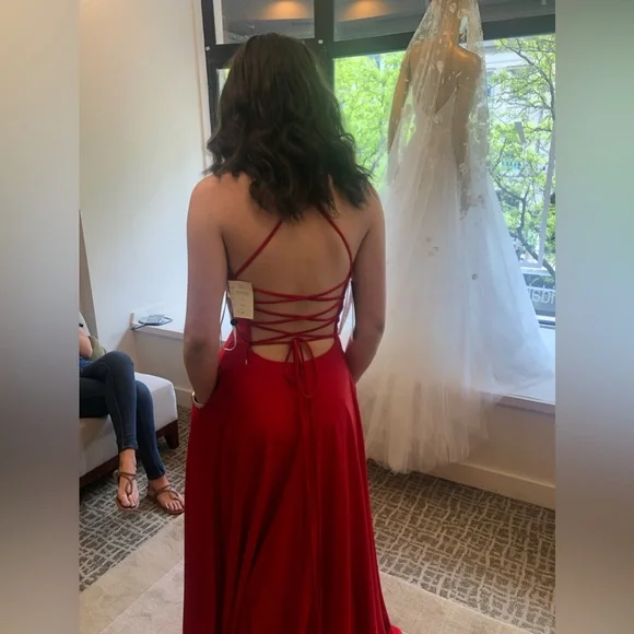 Such a beautiful bright red prom dress.